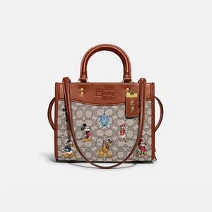 Coach Rogue 25 Disney